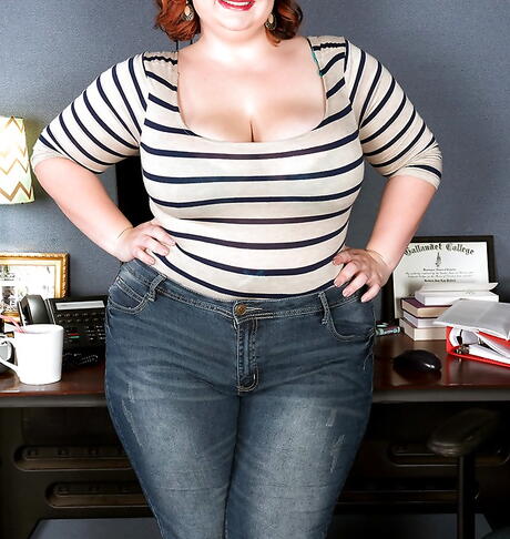 Sexy milf Lucy Lenore in tight jeans showing big hooters and jerking off in office